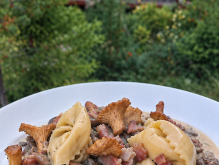 Ravioli ai funghi met pancetta & cantharellen